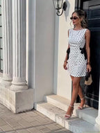 Vestido de verano 2026, novedad, estilo francés, elegante, casual, de moda urbana, sin mangas, para vacaciones, de ajuste entallado, sin espalda, con lazo de doble cara, vestido corto para mujer, vestido que estiliza la cintura, a la moda y versátil, adec