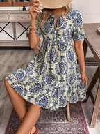 Vestido Elegante de Mujer con Estampado Floral - Cuello con Lazo, Manga Corta y Dobladillo con Volantes, Lavable a Máquina - Elección Perfecta para Primavera y Verano