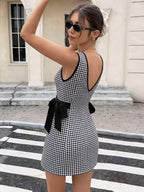 Vestido de verano 2026, novedad, estilo francés, elegante, casual, de moda urbana, sin mangas, para vacaciones, de ajuste entallado, sin espalda, con lazo de doble cara, vestido corto para mujer, vestido que estiliza la cintura, a la moda y versátil, adec